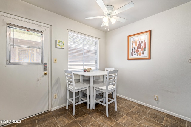 dining room featuring ceiling fan