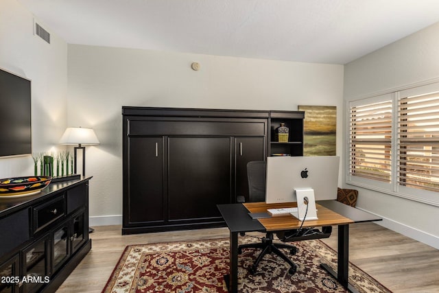 office area featuring light hardwood / wood-style flooring