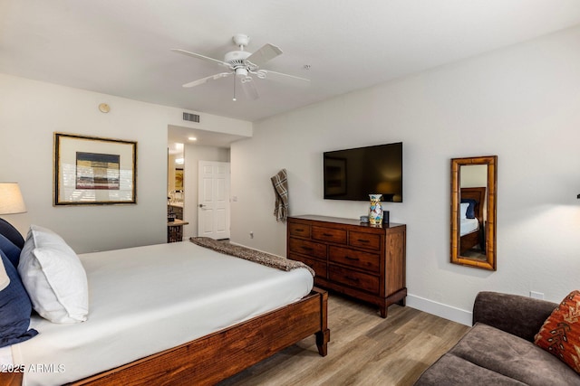 bedroom featuring ceiling fan and light hardwood / wood-style floors