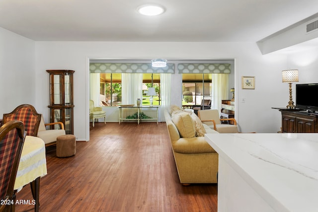 bedroom featuring dark wood-type flooring