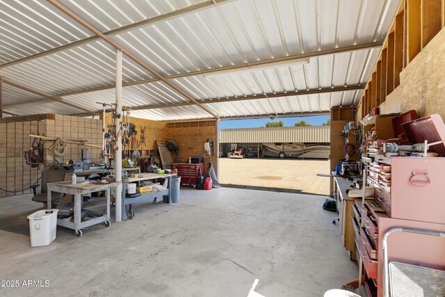 21230 S 156th St, Gilbert, AZ 85298 - garage with a workshop area and metal wall