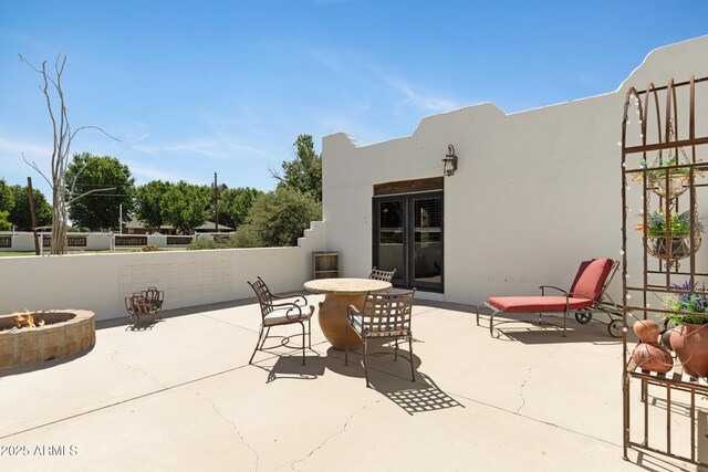 21230 S 156th St, Gilbert, AZ 85298 - view of patio with an outdoor fire pit and outdoor dining space