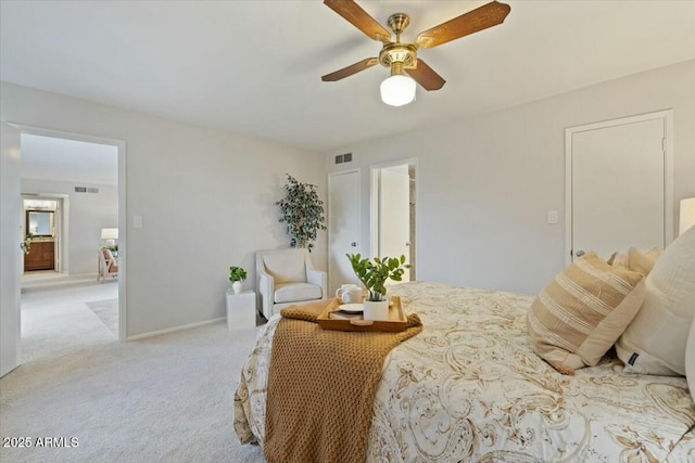 bedroom with light carpet and ceiling fan