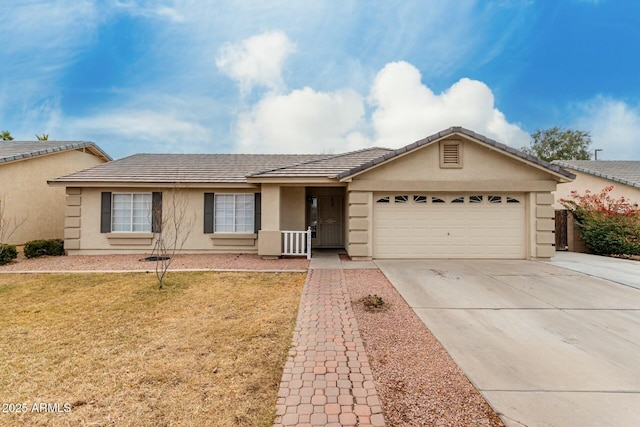 ranch-style house featuring a garage and a front yard