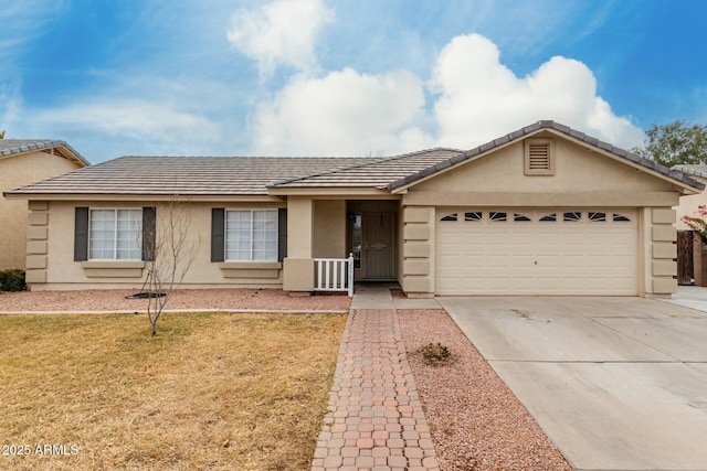 single story home with a garage and a front lawn