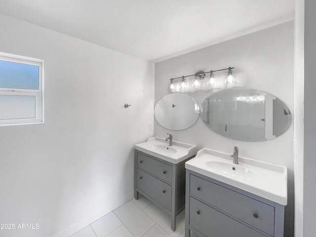 bathroom featuring an enclosed shower, vanity, and tile patterned floors