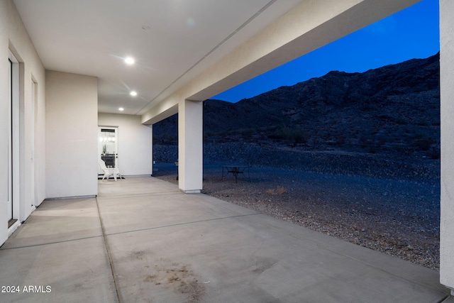 view of patio with a mountain view