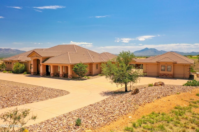 view of front of house with a mountain view