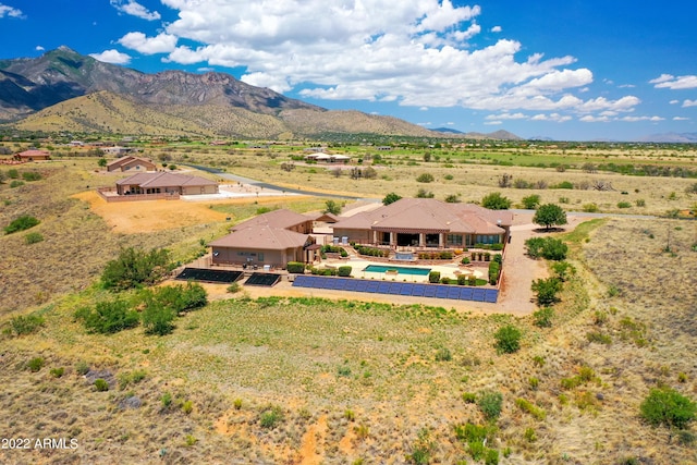 bird's eye view with a mountain view