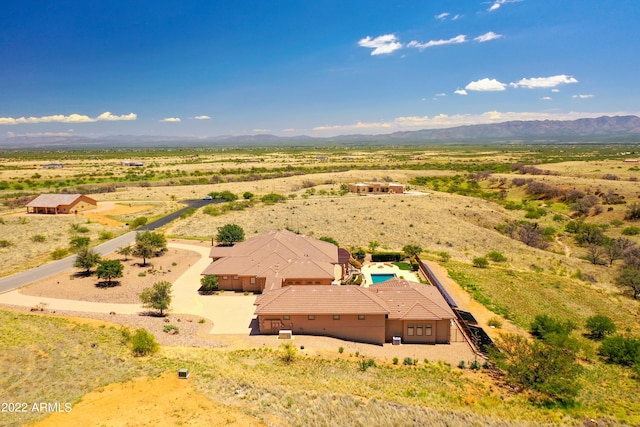 bird's eye view with a mountain view