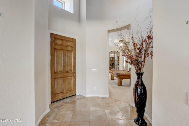 3660 S Golden Eye Ln, Gold Canyon, AZ 85118 - foyer entrance featuring a high ceiling, arched walkways, and baseboards