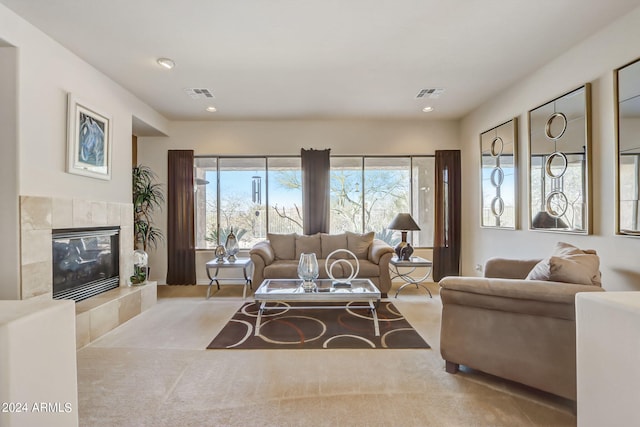 3660 S Golden Eye Ln, Gold Canyon, AZ 85118 - living room featuring carpet flooring, recessed lighting, a tiled fireplace, and visible vents