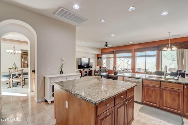 3660 S Golden Eye Ln, Gold Canyon, AZ 85118 - kitchen featuring visible vents, dishwasher, light stone countertops, a kitchen island, and a sink