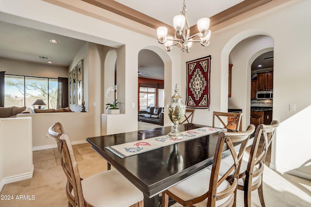 3660 S Golden Eye Ln, Gold Canyon, AZ 85118 - dining room featuring recessed lighting, baseboards, arched walkways, visible vents, and a notable chandelier
