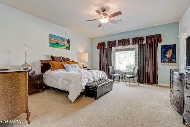 3660 S Golden Eye Ln, Gold Canyon, AZ 85118 - bedroom with visible vents, light carpet, baseboards, and ceiling fan