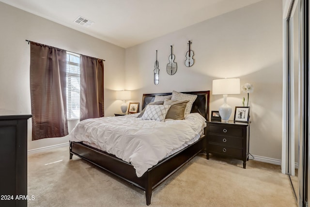 3660 S Golden Eye Ln, Gold Canyon, AZ 85118 - bedroom with baseboards, visible vents, and light colored carpet