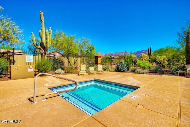 3660 S Golden Eye Ln, Gold Canyon, AZ 85118 - view of pool with a pool, a mountain view, fence, and a patio area