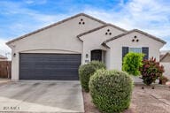2614 S 120th Ave, Avondale, AZ 85323 - view of front of house featuring a garage and driveway