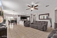 2614 S 120th Ave, Avondale, AZ 85323 - living area featuring ceiling fan and tile patterned floors