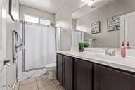 2614 S 120th Ave, Avondale, AZ 85323 - bathroom with vanity, toilet, and tile patterned floors