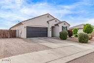 2614 S 120th Ave, Avondale, AZ 85323 - view of front of home with a garage and driveway
