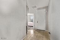 2614 S 120th Ave, Avondale, AZ 85323 - hall with baseboards and light tile patterned flooring
