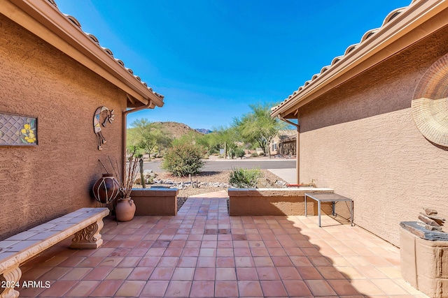 view of patio featuring a mountain view