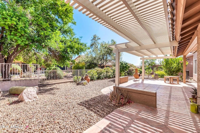 view of patio featuring a pergola