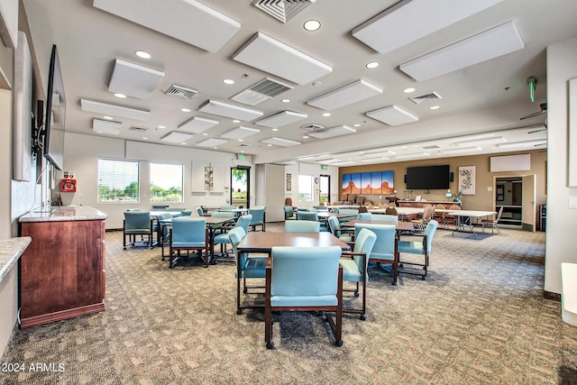 dining space with light carpet