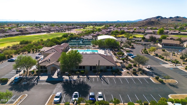 birds eye view of property with a mountain view