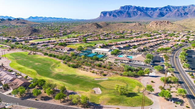 birds eye view of property with a mountain view