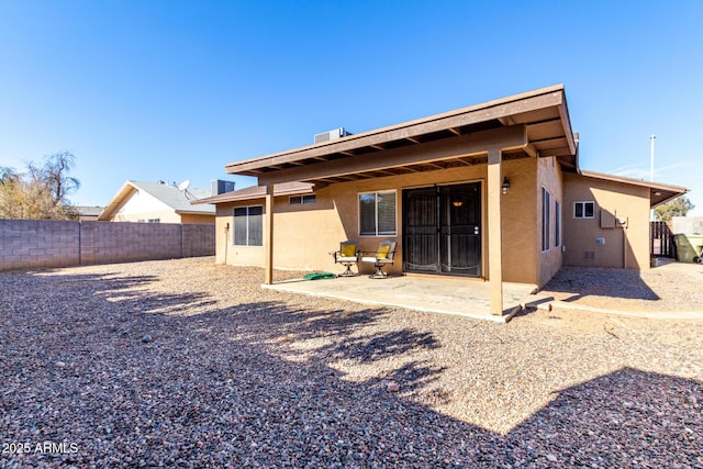 back of house featuring a patio area