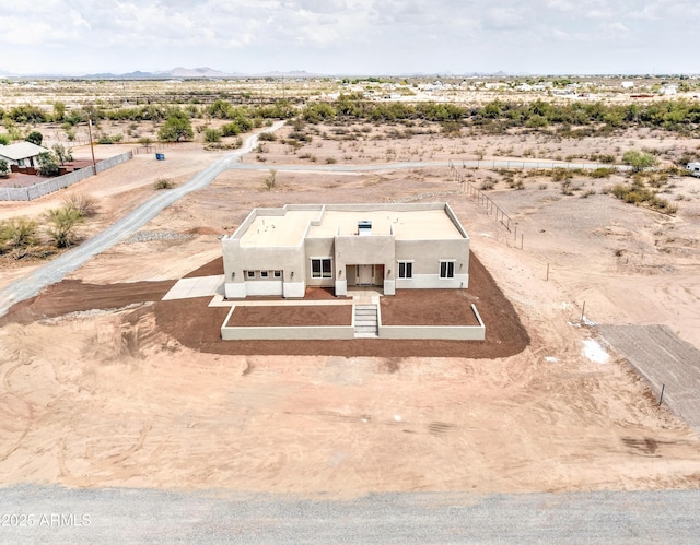 22009 W Montgomery Rd, Wittmann, AZ 85361 - aerial view of sparsely populated area with a desert landscape and mountains