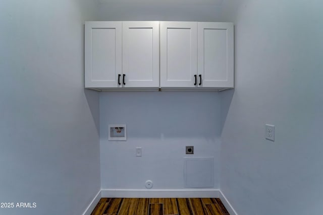 22009 W Montgomery Rd, Wittmann, AZ 85361 - clothes washing area featuring cabinet space, electric dryer hookup, hookup for a washing machine, baseboards, and dark wood finished floors