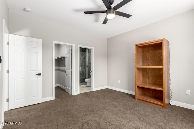 683 W Raymond St, Coolidge, AZ 85128 - unfurnished bedroom featuring a walk in closet, carpet floors, baseboards, a closet, and ensuite bathroom