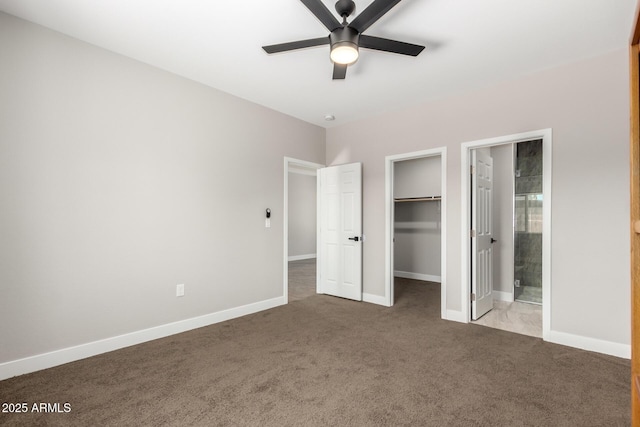 683 W Raymond St, Coolidge, AZ 85128 - unfurnished bedroom featuring carpet flooring, a spacious closet, baseboards, a closet, and ensuite bathroom
