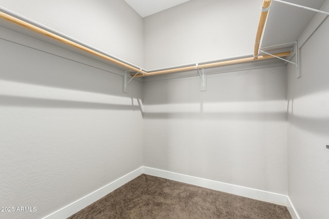 683 W Raymond St, Coolidge, AZ 85128 - walk in closet featuring dark carpet