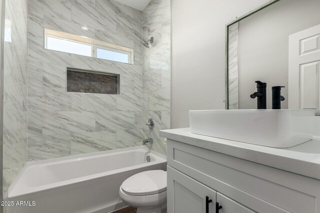 683 W Raymond St, Coolidge, AZ 85128 - bathroom with vanity, toilet, and bathing tub / shower combination