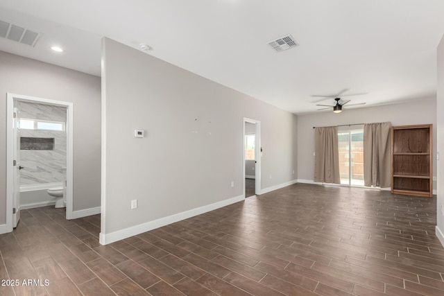 683 W Raymond St, Coolidge, AZ 85128 - spare room featuring a ceiling fan, dark wood-type flooring, baseboards, and recessed lighting