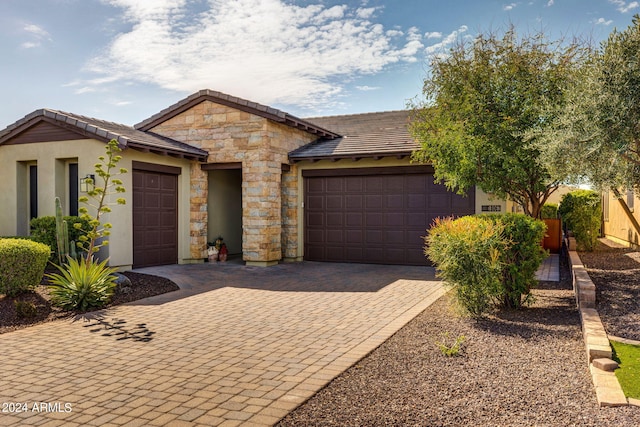 ranch-style house with a garage