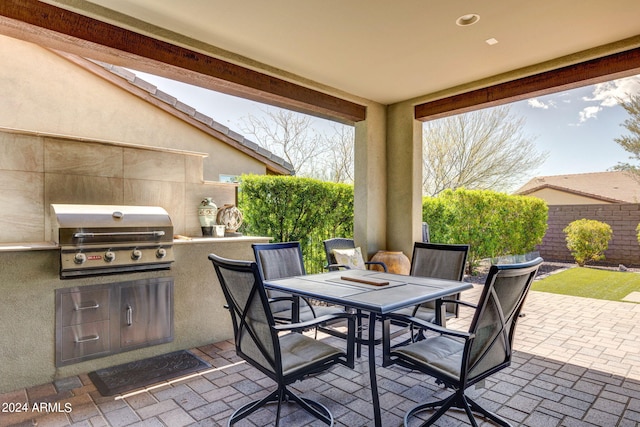 view of patio / terrace with a grill and area for grilling