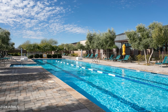 view of pool featuring a patio area