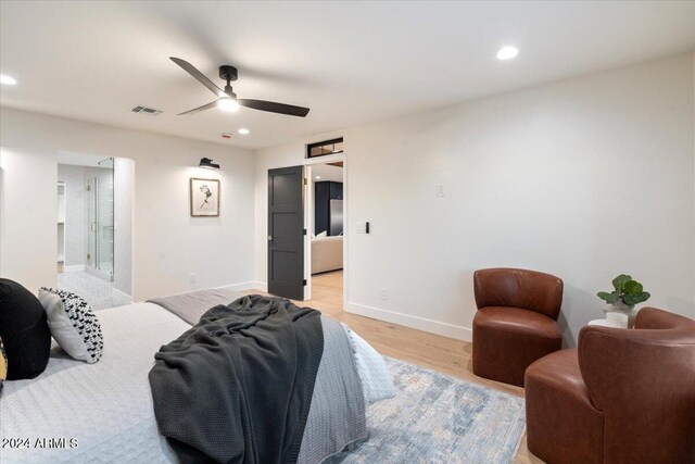 bedroom with baseboards, recessed lighting, ceiling fan, and light wood finished floors