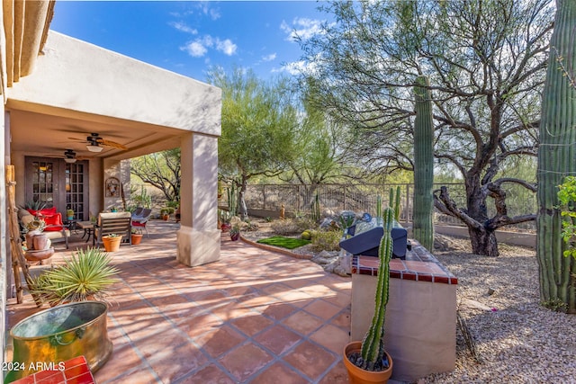 view of patio with ceiling fan