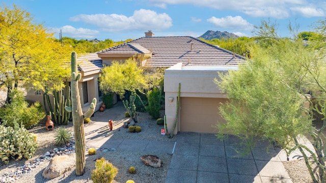 view of front of house featuring a mountain view