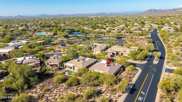 drone / aerial view featuring a mountain view