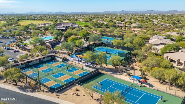 birds eye view of property featuring a mountain view