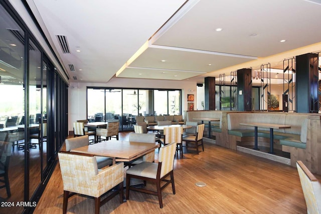 dining space with light wood-type flooring