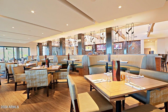 dining area featuring light wood-type flooring