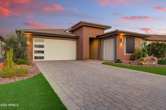 prairie-style home with a garage